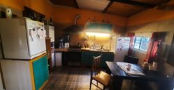 Se vende Casa en esquina a metros del Río en Andino.